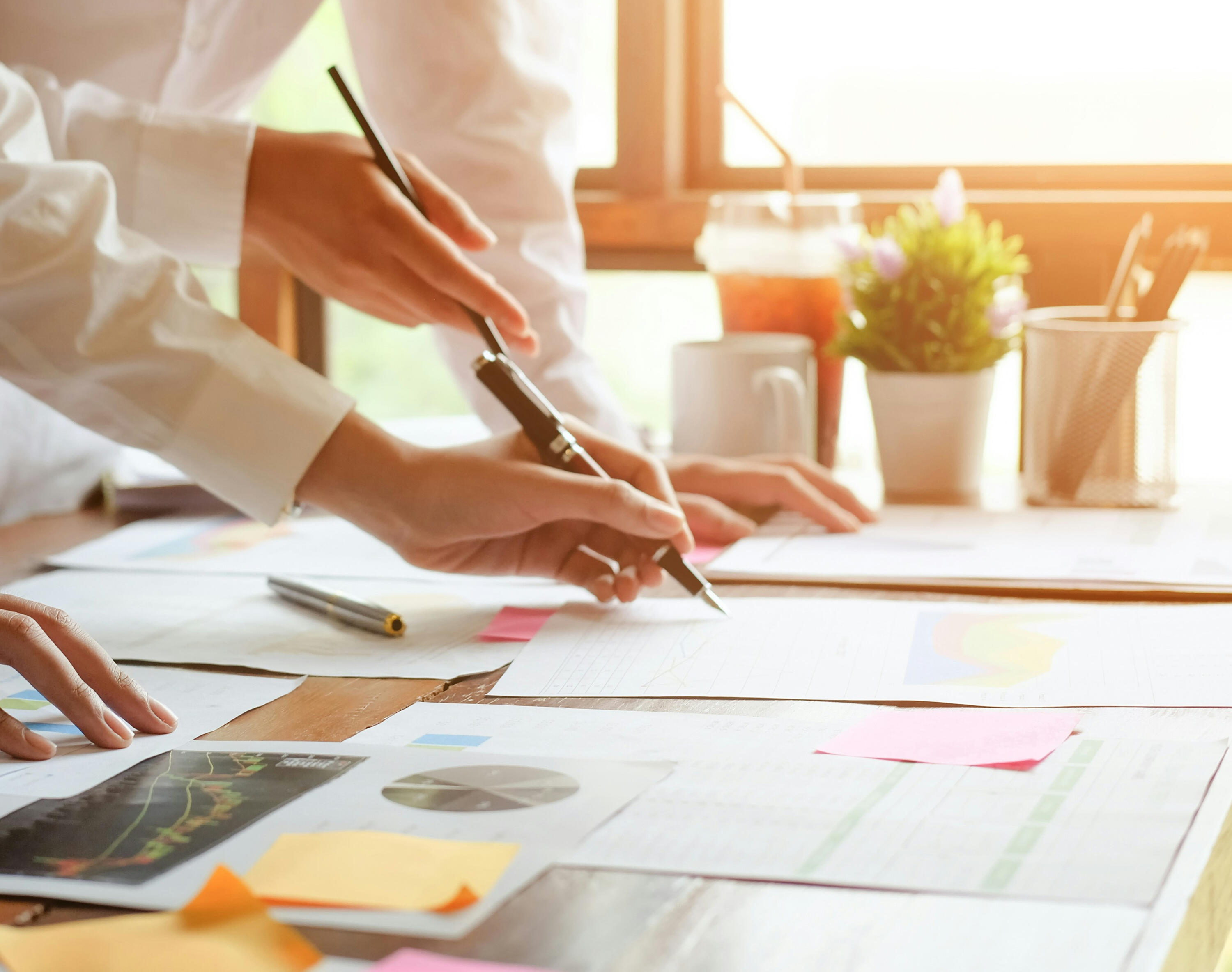 The WhiteCliff Group A conference room with wooden table and leather executive chairs